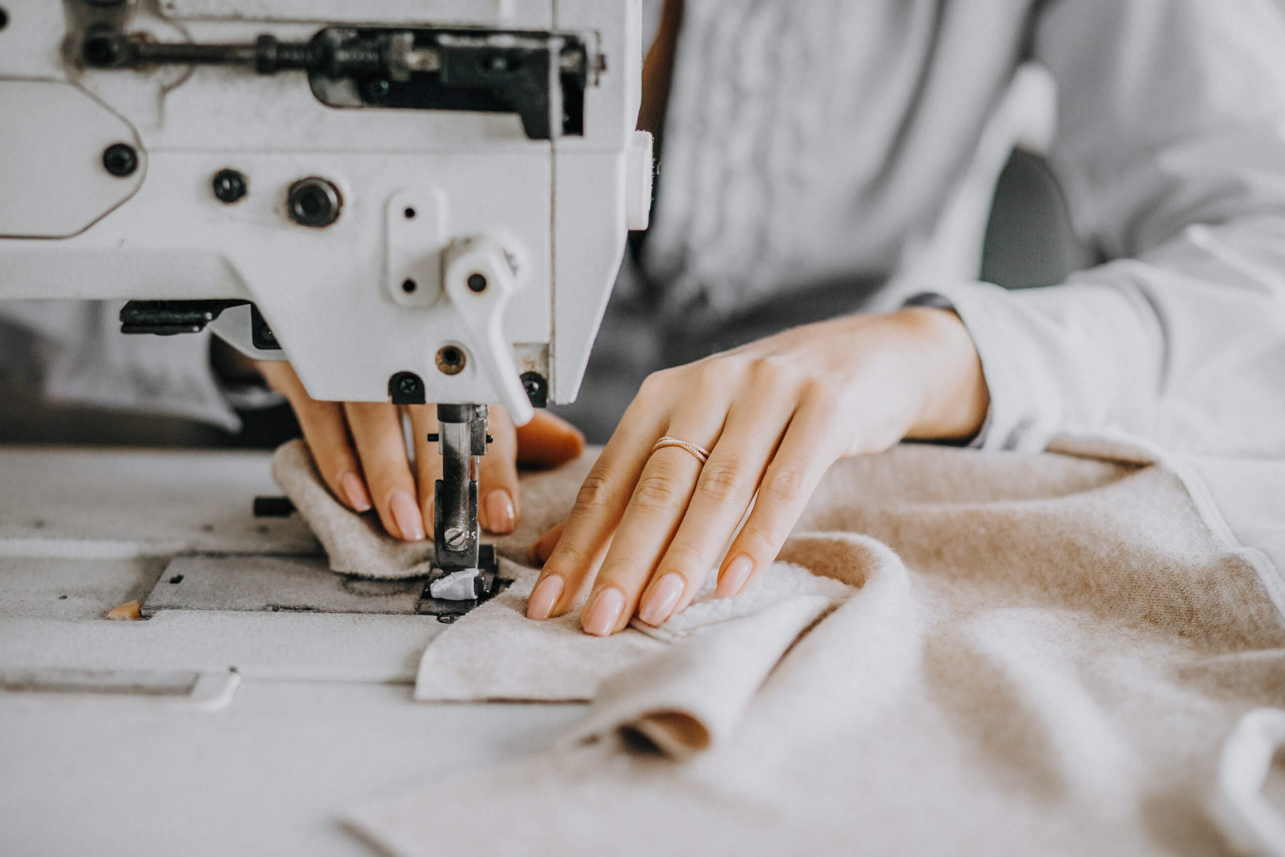 woman-tailor-working-sewing-factory-scaled